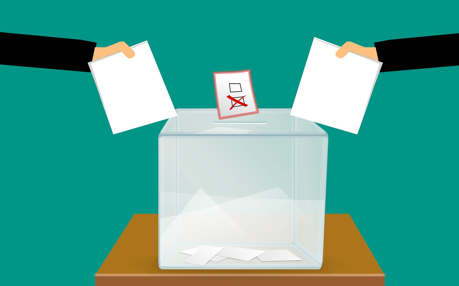 Two hands, on each side of a table, reach towards a voting box with their ballots